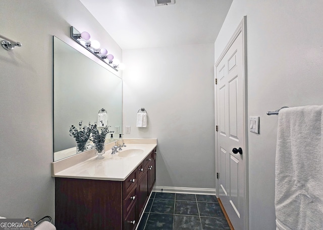 bathroom with tile floors and oversized vanity