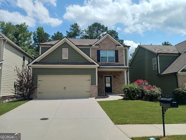 craftsman house with a front yard and a garage