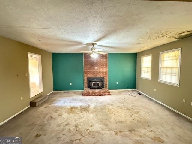 unfurnished living room with a textured ceiling