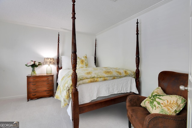 bedroom featuring carpet, ornamental molding, and a textured ceiling