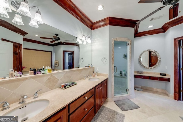 bathroom featuring tile patterned floors, crown molding, vanity, a shower with door, and ceiling fan