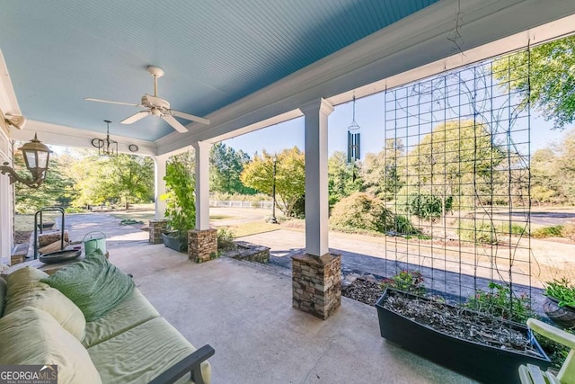 view of patio with ceiling fan