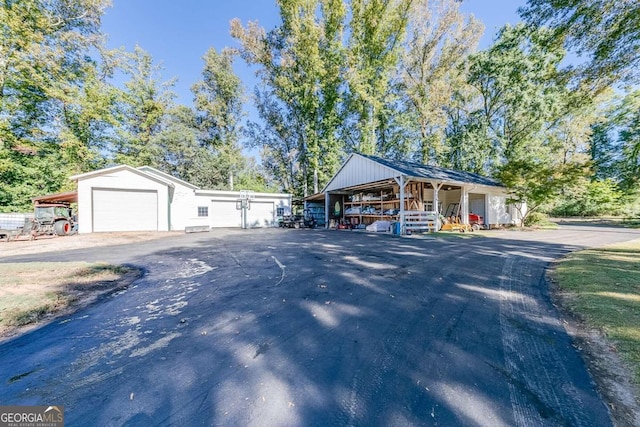 view of front of house with an outdoor structure