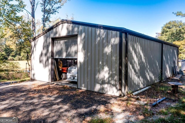 view of outbuilding featuring a garage