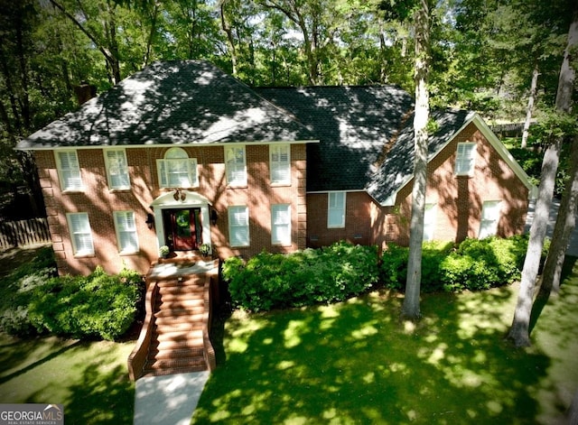 view of front of property with a front lawn