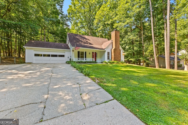 ranch-style house with a porch, a garage, and a front yard