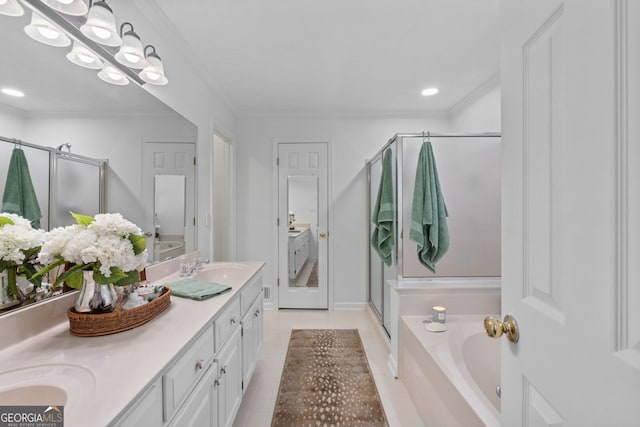 bathroom with tile patterned flooring, crown molding, double sink vanity, and plus walk in shower