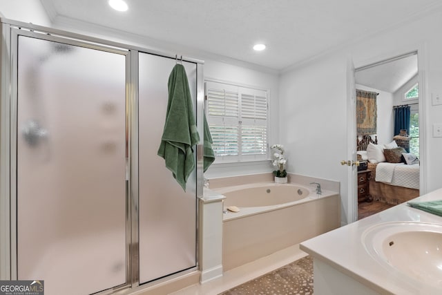 bathroom featuring sink, crown molding, lofted ceiling, and separate shower and tub