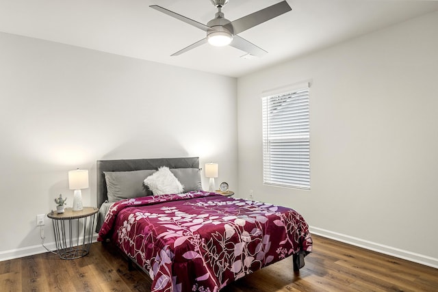 bedroom with hardwood / wood-style flooring and ceiling fan