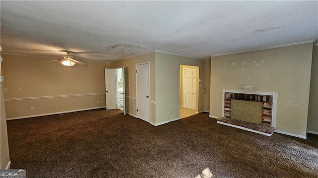 unfurnished living room featuring carpet, ornamental molding, a textured ceiling, and a brick fireplace