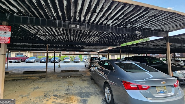 garage with a carport