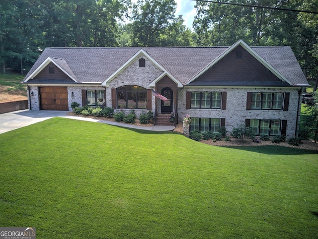 view of front facade featuring a garage and a front yard