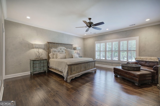 bedroom featuring dark hardwood / wood-style floors, ceiling fan, and crown molding