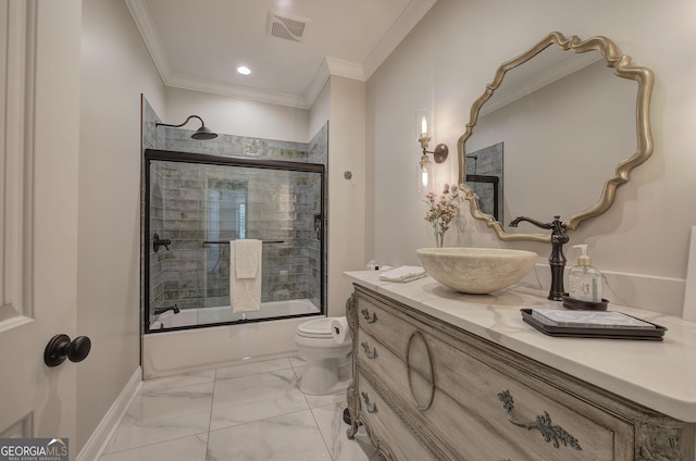 full bathroom featuring shower / bath combination with glass door, vanity, toilet, and ornamental molding