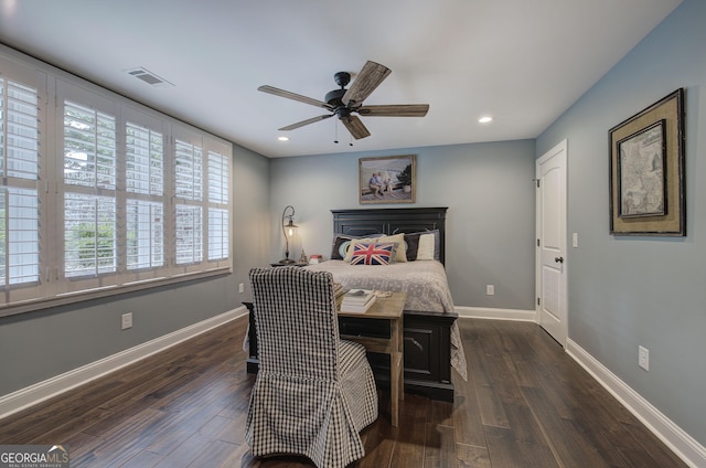 bedroom with ceiling fan and dark wood-type flooring