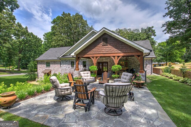 view of patio with a fire pit