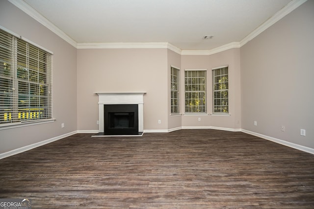 unfurnished living room with crown molding and dark hardwood / wood-style floors