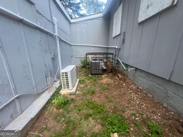 details featuring central AC unit, ac unit, and a skylight