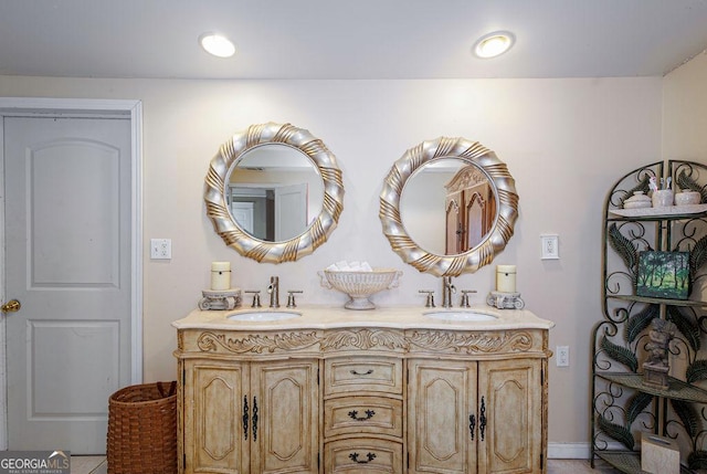 bathroom featuring tile patterned floors and vanity