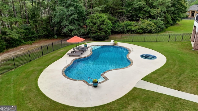 view of pool featuring a yard and a patio