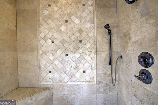 details featuring a tile shower