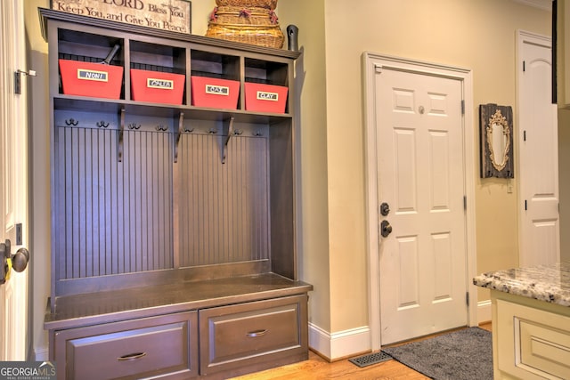 mudroom with light wood-type flooring