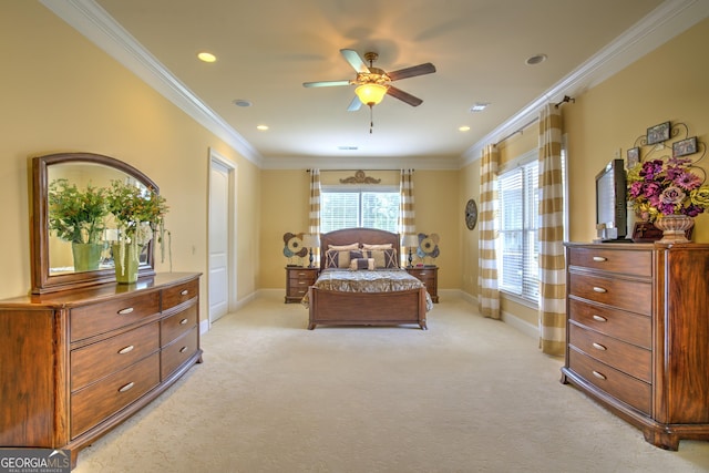 carpeted bedroom featuring crown molding and ceiling fan