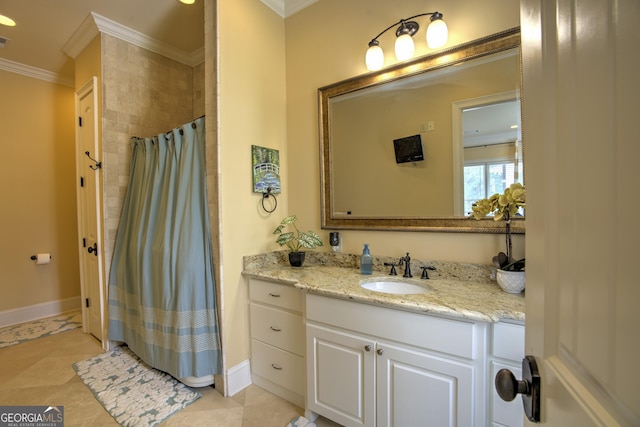 bathroom with crown molding, a shower with curtain, tile patterned floors, and vanity