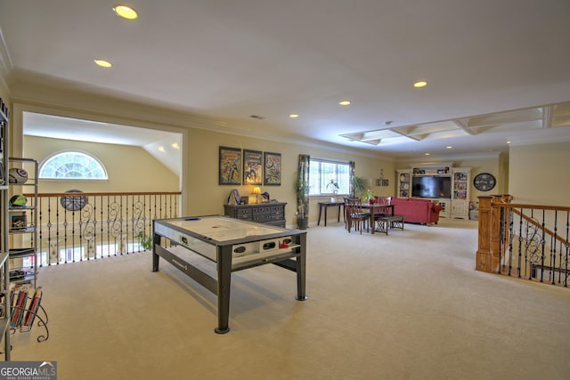 game room with light colored carpet and ornamental molding