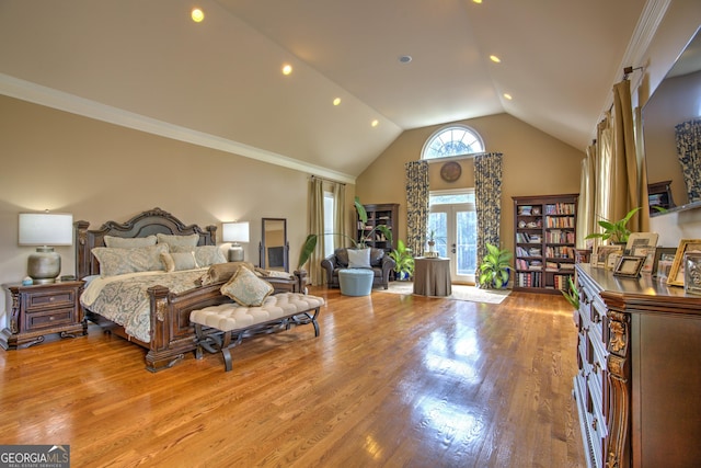 bedroom featuring wood-type flooring, french doors, high vaulted ceiling, and crown molding