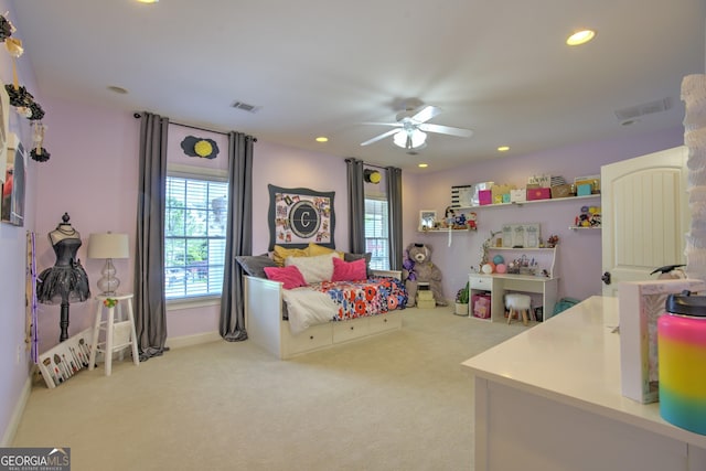 carpeted bedroom with ceiling fan