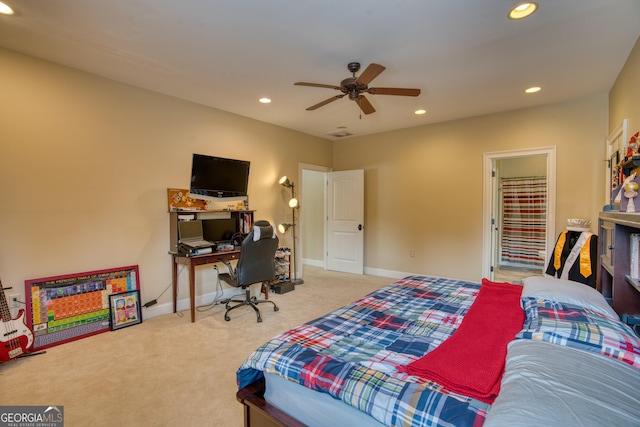 bedroom featuring ceiling fan and light colored carpet