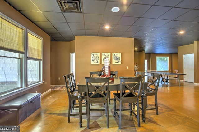 dining room featuring a paneled ceiling