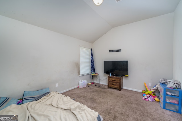 carpeted bedroom featuring lofted ceiling