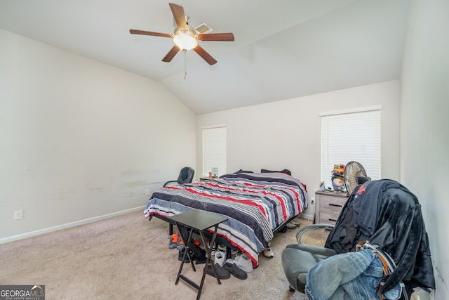 carpeted bedroom featuring ceiling fan and lofted ceiling