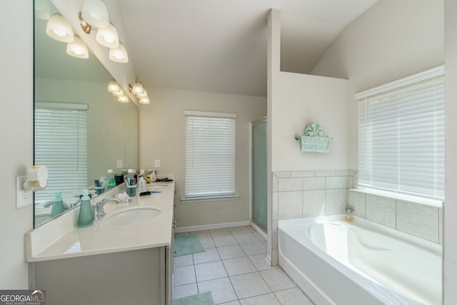 bathroom featuring vanity, tile patterned floors, and separate shower and tub