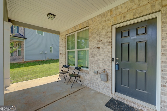 property entrance featuring covered porch