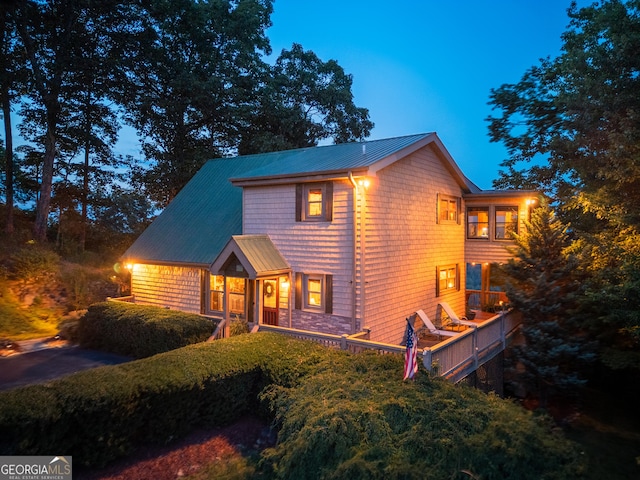 view of front of house featuring a standing seam roof and metal roof