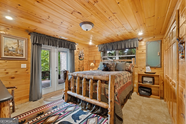 bedroom featuring access to exterior, wooden walls, and wooden ceiling