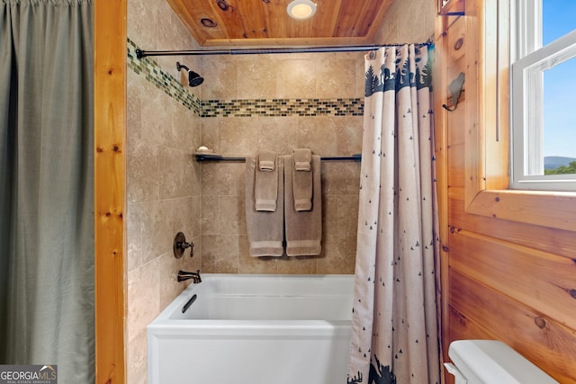 full bath featuring shower / tub combo, toilet, and wooden ceiling