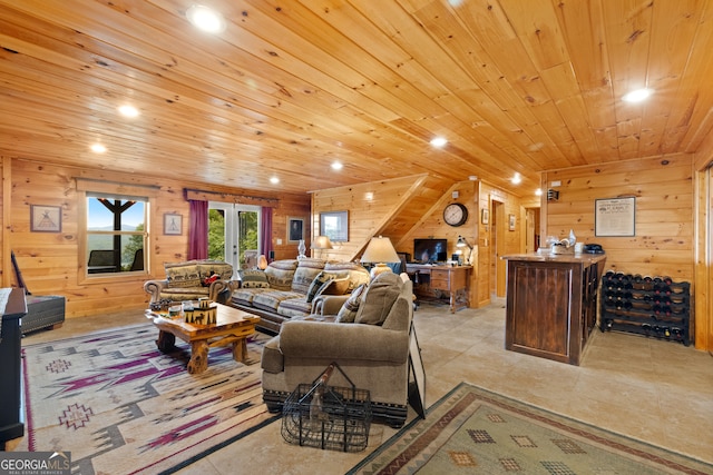 tiled living room featuring wood ceiling and wooden walls