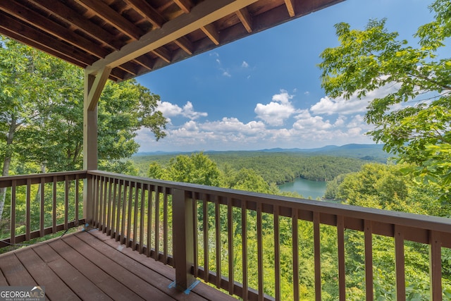 deck featuring a water view