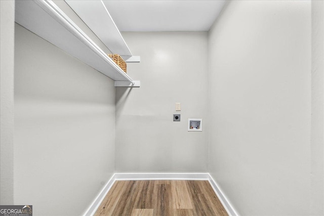 laundry area featuring washer hookup, hardwood / wood-style floors, and hookup for an electric dryer