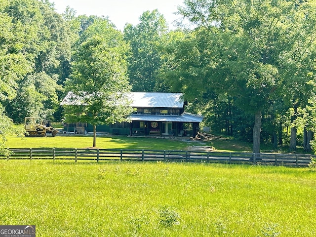 view of yard featuring a rural view