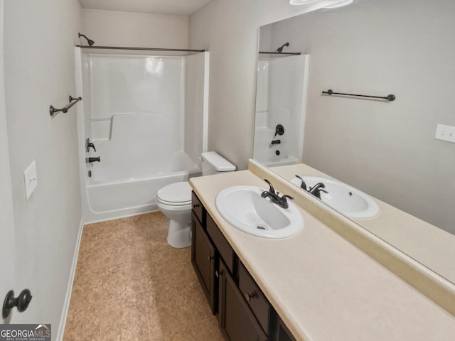 full bathroom with shower / tub combination, vanity, and toilet