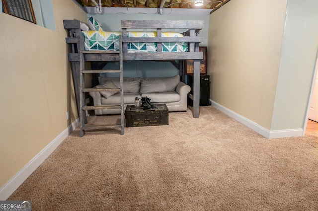 104 Streambank Ct, Temple, GA 30179 - carpeted bedroom featuring baseboards