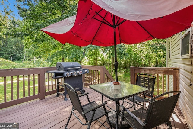 104 Streambank Ct, Temple, GA 30179 - deck featuring area for grilling and outdoor dining space