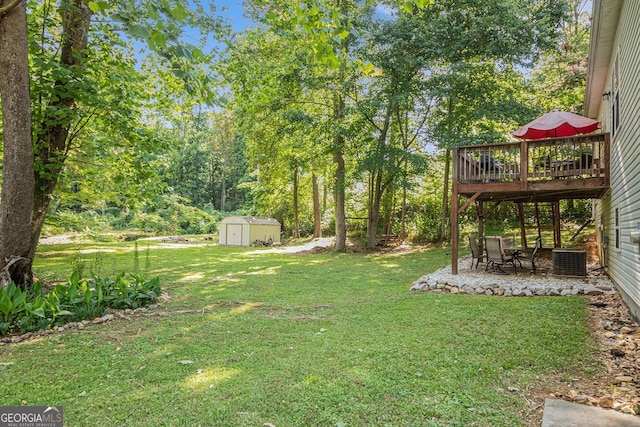 104 Streambank Ct, Temple, GA 30179 - view of green lawn featuring a deck, a patio area, and cooling unit