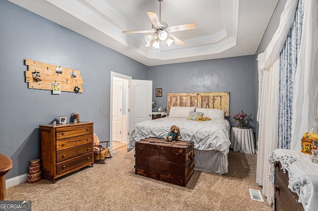 104 Streambank Ct, Temple, GA 30179 - carpeted bedroom featuring a raised ceiling, a ceiling fan, ornamental molding, and baseboards