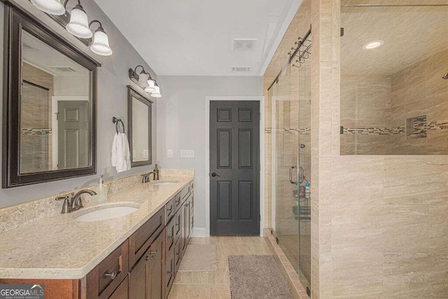1985 Roscoe Rd, Newnan, GA 30263 - full bathroom featuring double vanity, a sink, visible vents, and a shower stall